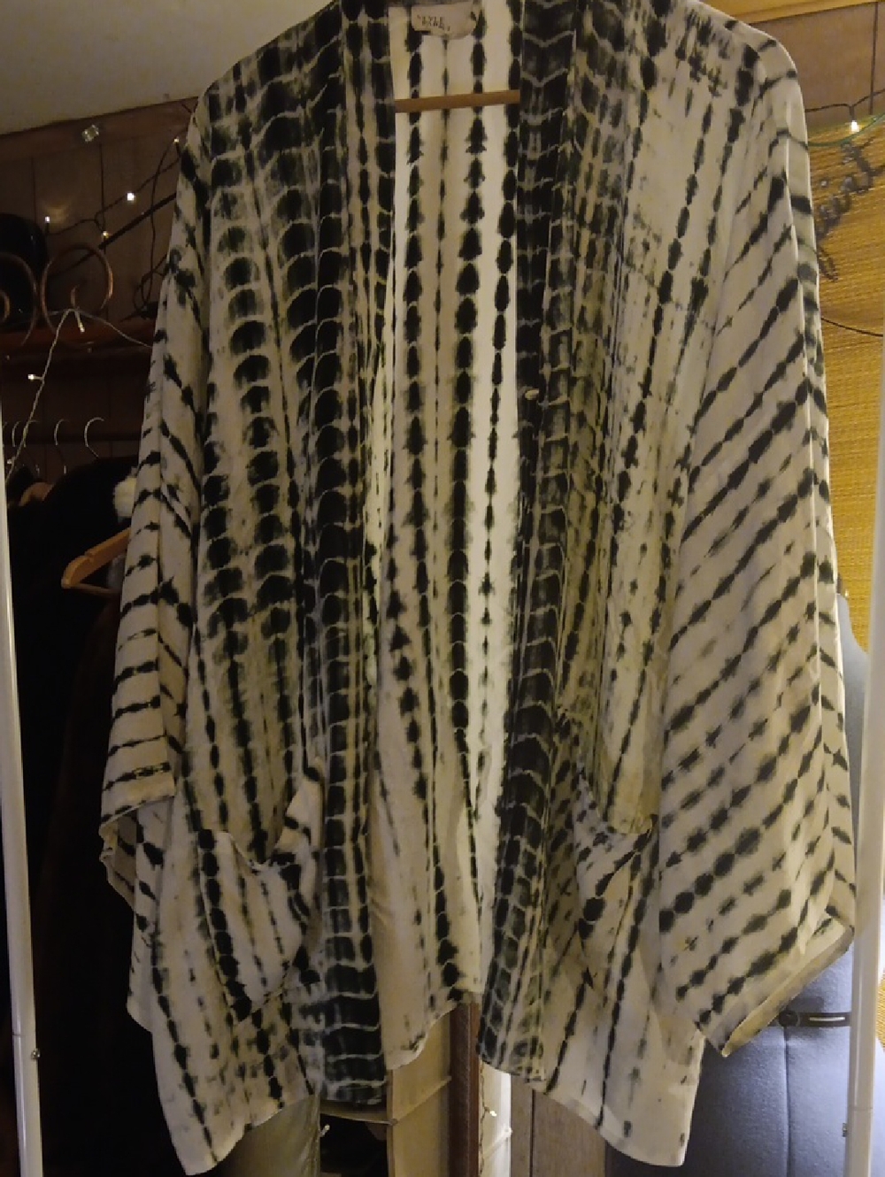 Lightweight Black and White Tie-Dye Kimono Top With Tie and Two Front Pockets.